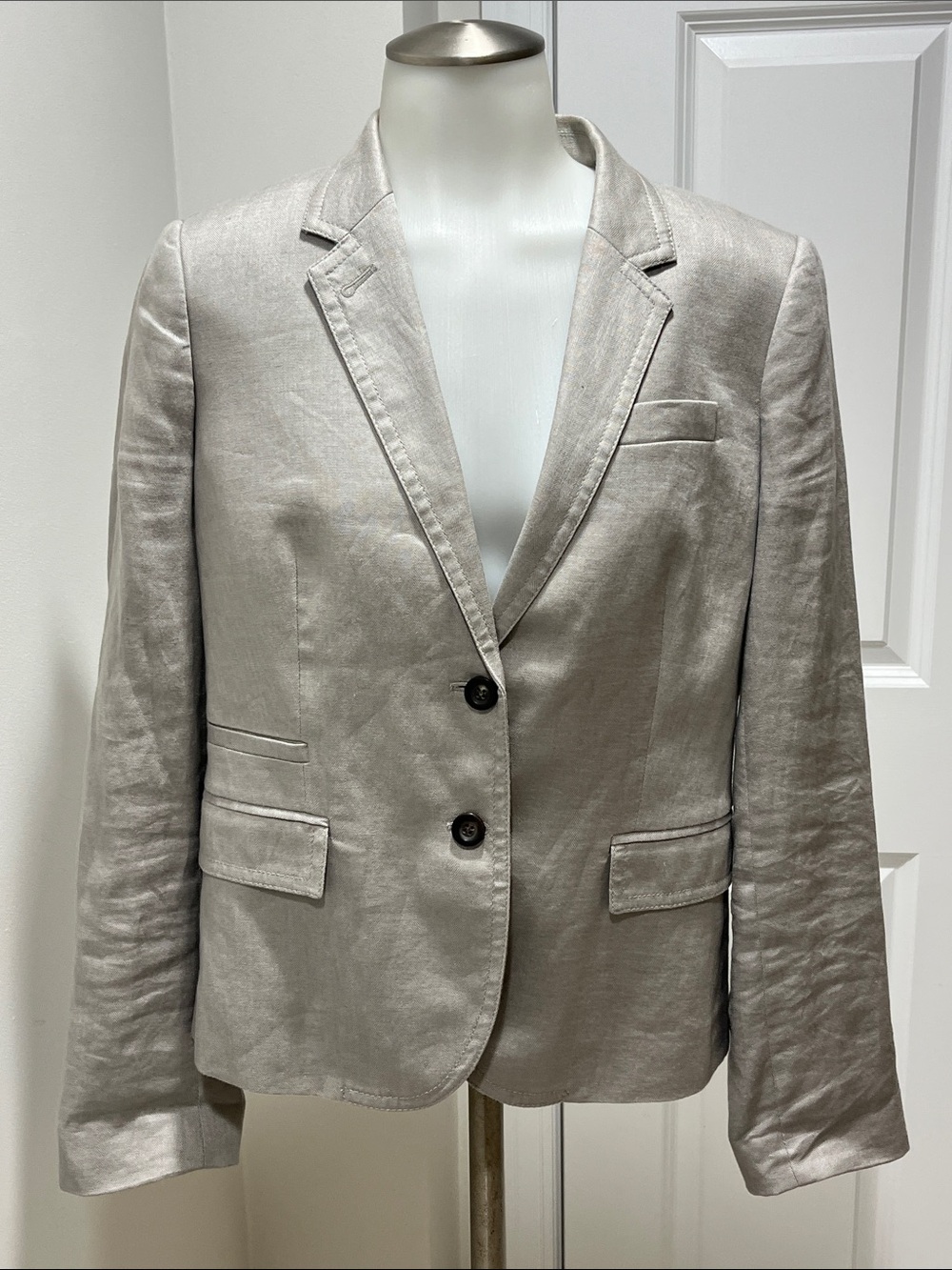 J Crew gray linen blazer. Two buttons in front w/ decorative pockets. Size 10.
